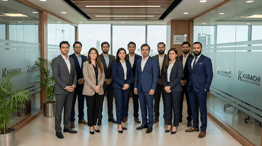 Professional Pak Invest team in modern Karachi office